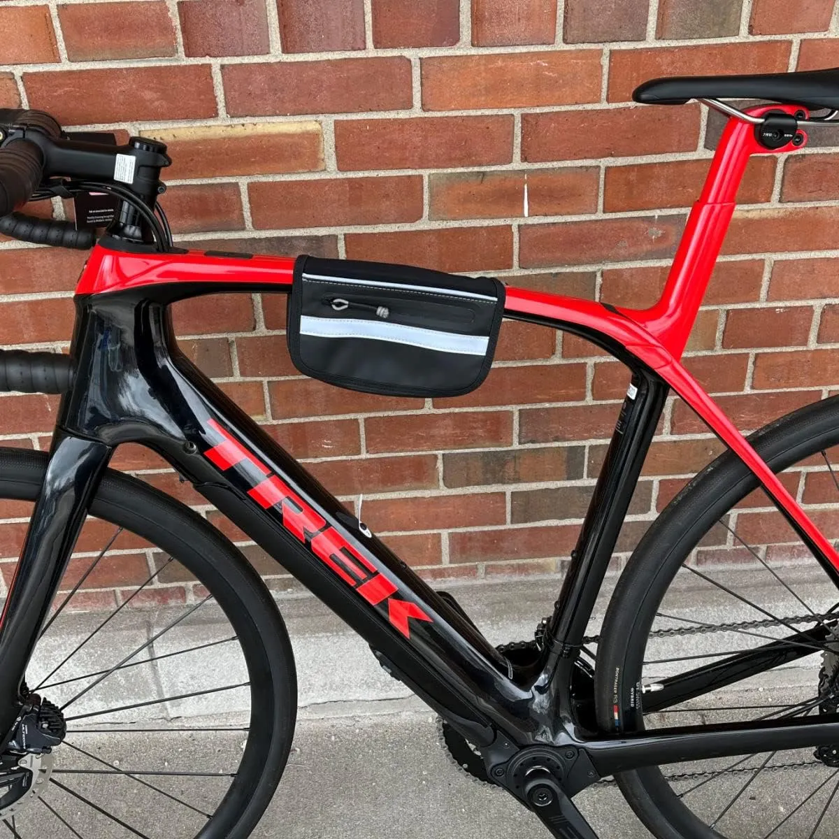 BiKase Clutch - Sleek bike clutch bag that mounts to your bike or you can wear. Cross body bag that converts to bike bag in a snap