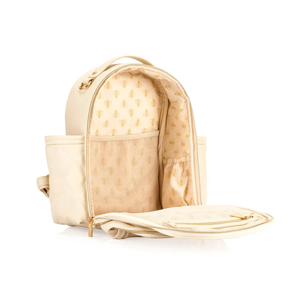 Itzy Ritzy -  Itzy Mini Plus™ Diaper Bag Backpack Milk & Honey
