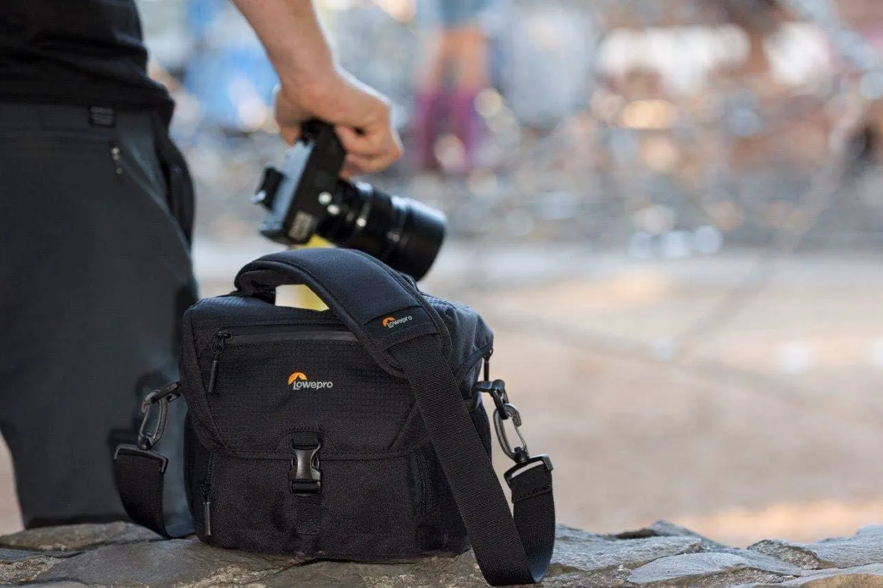 Lowepro LP37117, Nova 140AW II Camera Bag, Customizable, Portable, Fits Mirrorless with 17-85mm Attached Lens, Compact Drone, Flash, Black